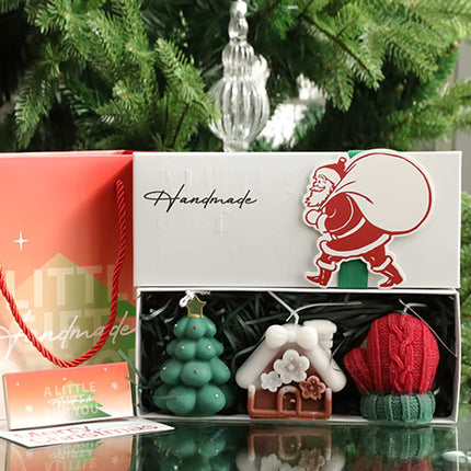 3-piece gift set box with green tree, white snowflake, and red textured candles