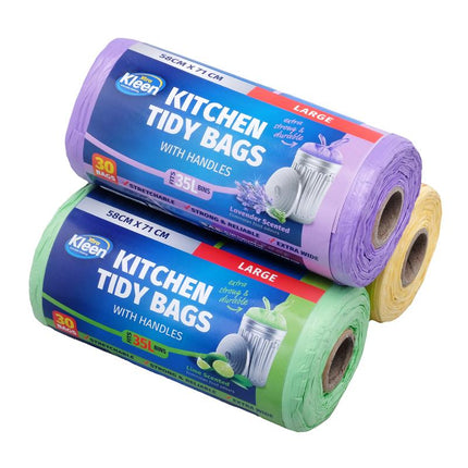 Stacked kitchen tidy bag rolls with handles, large size, purple and green with yellow