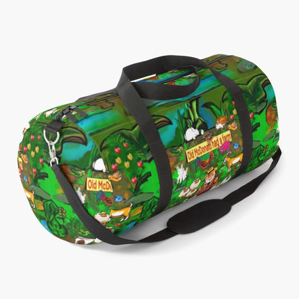 Green cartoon print carry bag with black handle straps and Old MacDonald graphic