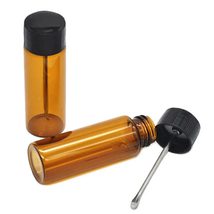 Amber glass canister with black lid and stainless spoon insert, bottle dispenser