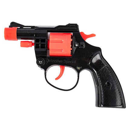 Black cap gun with red top barrel and side switch, textured handle grip.