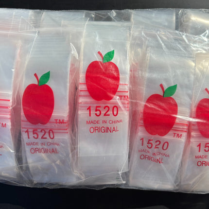 Set of transparent ziplock bags with red apple logos and '1520 ORIGINAL' print