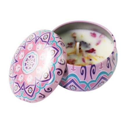 Decorative votive soy candle in patterned purple-blue tin, lid open