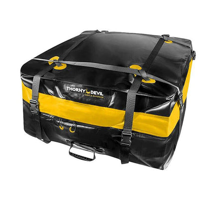 Black and yellow PVC cargo bag with top flap, front logo, and padded carry straps