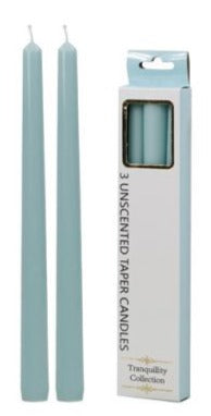 Tapered teal unscented candles with wicks, shown with gift box
