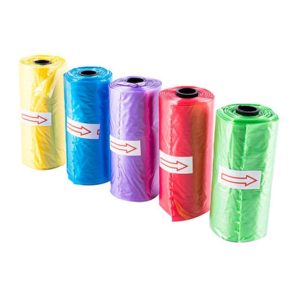 Five dog waste bag rolls in yellow, blue, purple, red, and green with black dispensing cores