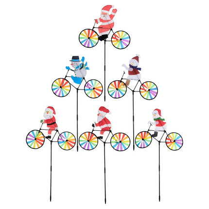 Set of multiple Christmas windmill spinner yard stakes with Santas and snowmen on bicycles
