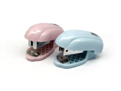 Pair of mini staplers in pink and light blue, front views with staple base visible
