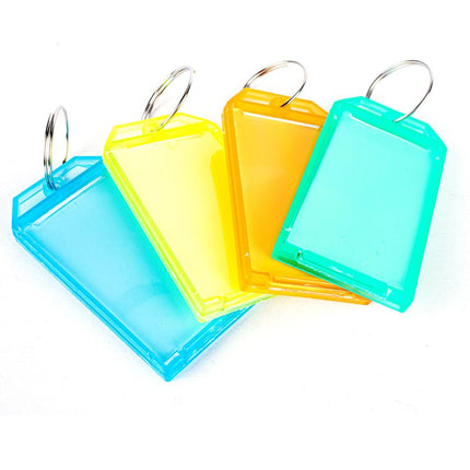 Assorted jumbo translucent key tags with metal rings in blue, yellow, orange, and teal