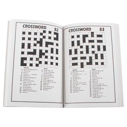 A5 crossword puzzle book open to two pages with black-and-white grid and clue lists