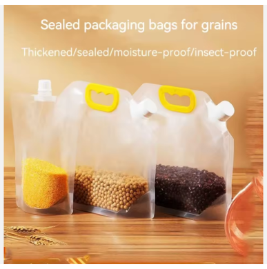 Reusable foldable liquid bag with spout, transparent body and yellow carry handle.