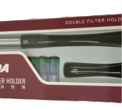 Double filter cigarette holder in maroon case, showing black holder and label strip