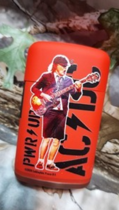 Orange AC/DC guitarist graphic jet lighter with bold lightning logo