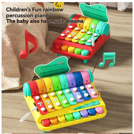 Rainbow xylophone music toy with colorful bars, white mallet, and music note cards