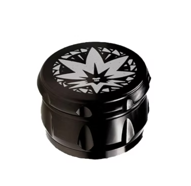 Black zinc herb grinder with leaf-pattern lid and metal teeth