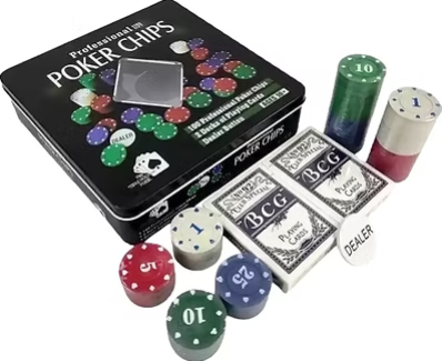 Poker set with chips and playing cards near a black tin case, multicolor poker chips