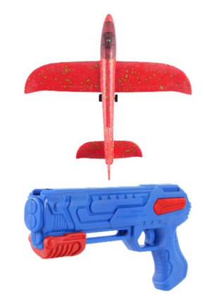 Toy glider launcher with blue foam blaster and speckled red glider plane