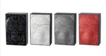 Plastic cigarette cases with embossed skull design, black, silver, gray, and red