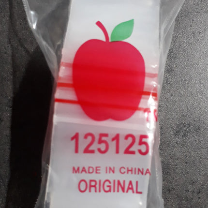 Mini ziplock bag with apple print, red zipper-seal top, clear plastic pouch